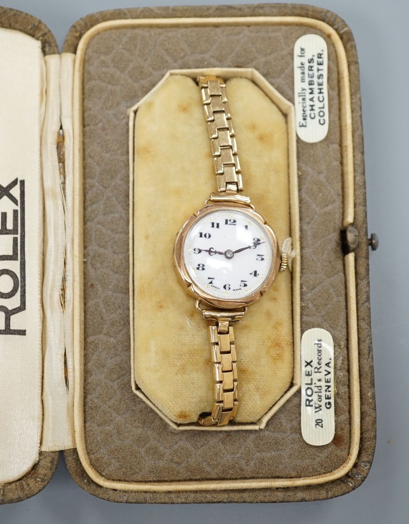 A lady's early 20th century 9ct gold Rolex manual wind wrist watch, on an associated 9ct gold bracelet